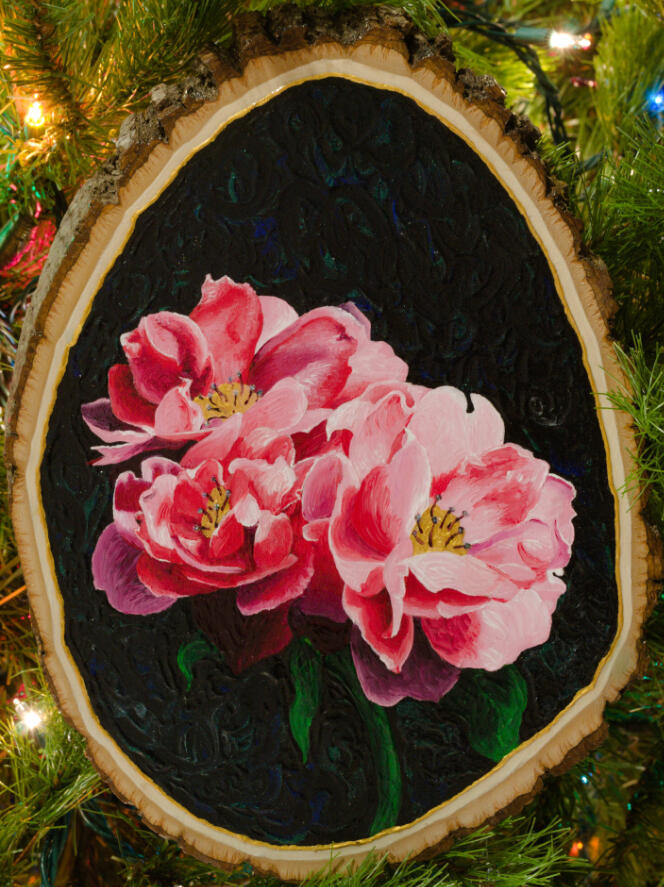 A painting of pink flowers against a dark background with blue and green glittery swirls